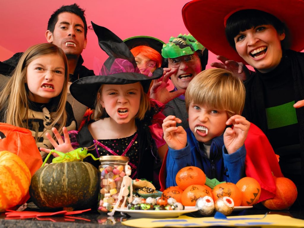 family celebrating Halloween