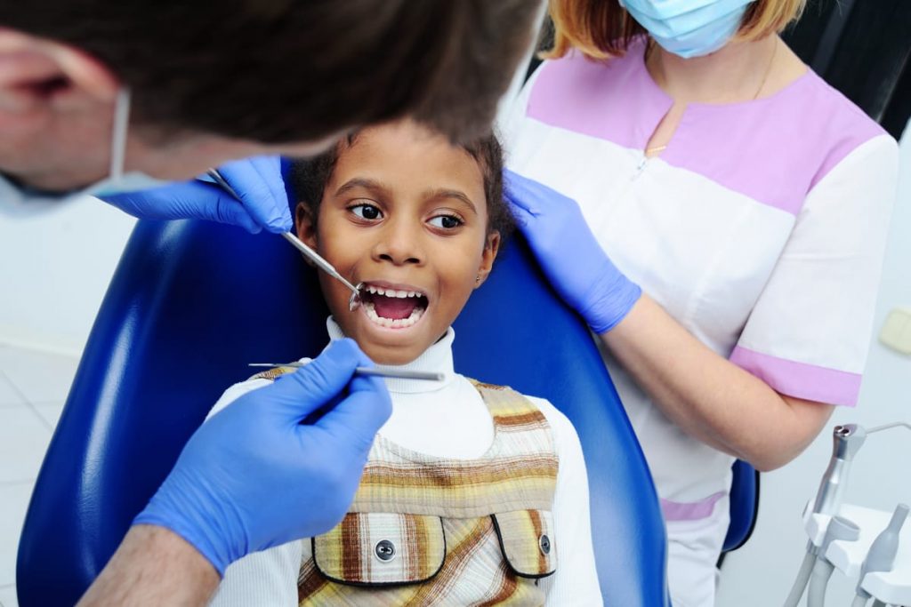 child at calgary dentist office