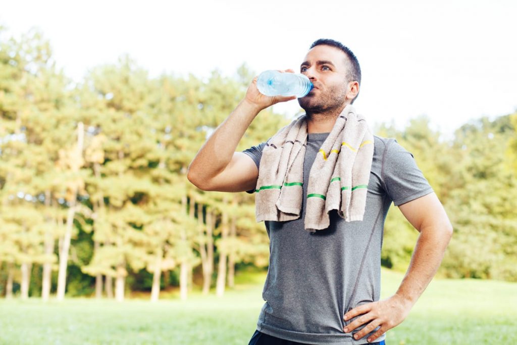 athlete drinking water