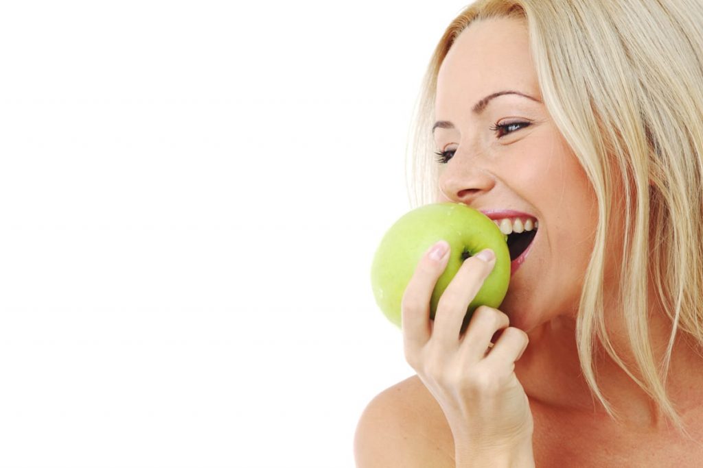 woman eating an apple