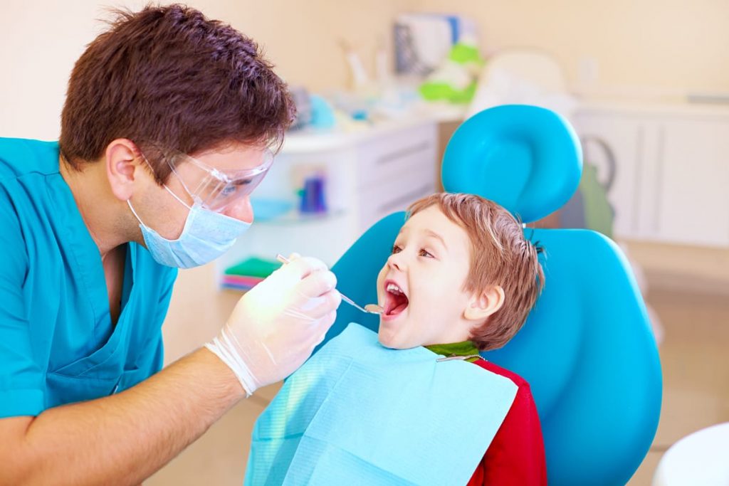 child at the dentist