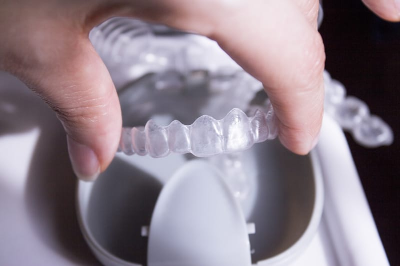 invisalign placed in holder