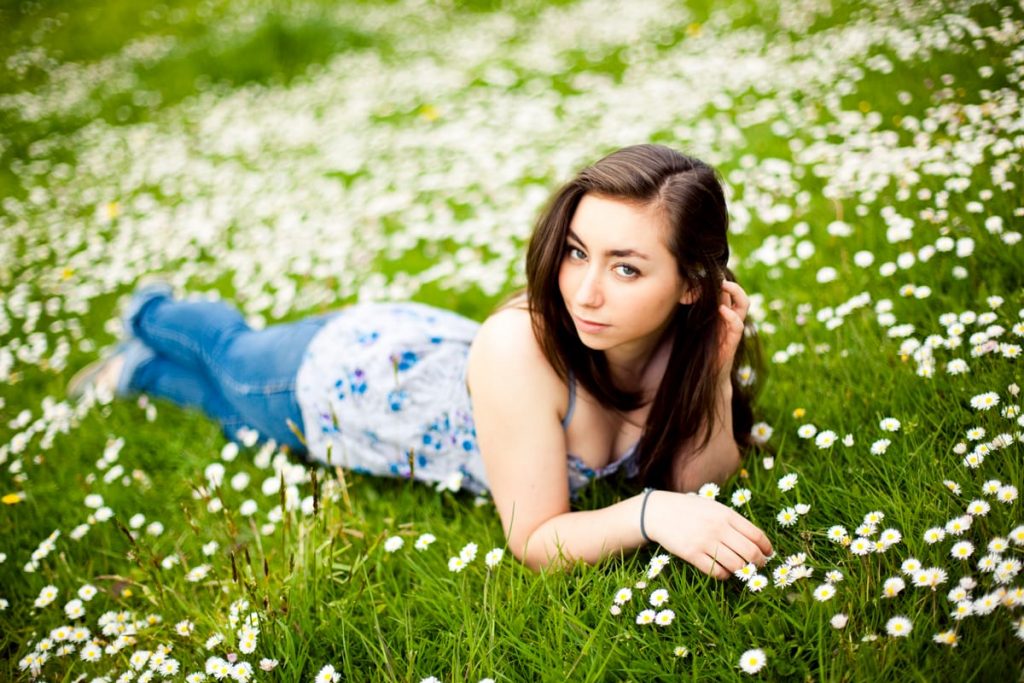 woman in field of flowers