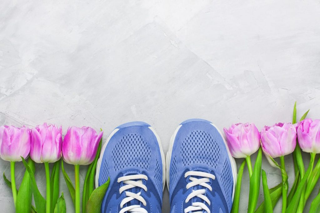 photo of sneakers and flowers