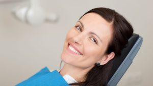 woman smiling in dentist chair