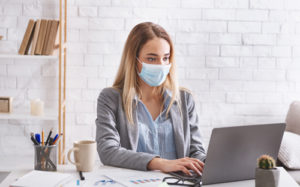 woman at work wearing a mask